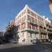 Ci dirigiamo ora su via Emanuele Mola, stradina che conta ben quindici edifici storici. Se ad angolo con via Tanzi scoviamo una costruzione pi elegante e in stile eclettico...